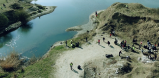 50 de elevi de la Titulescu au strâns gunoaie între Barajul Arcești și Barajul Slătioara. VIDEO spectaculos despre râul Olt la acțiunea de ecologizare